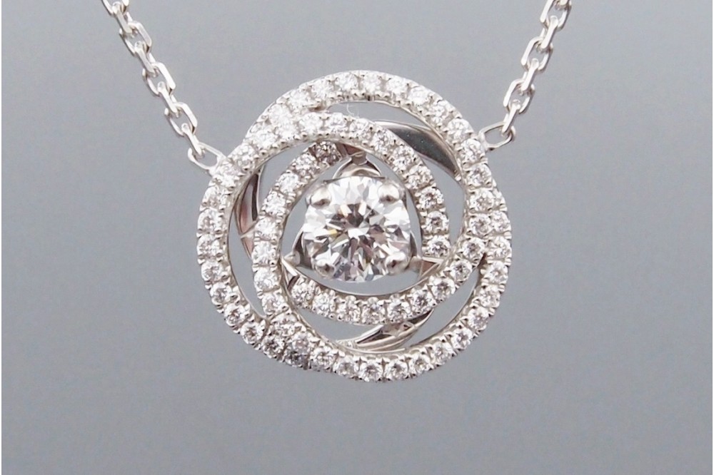 Pendentif “Arabesque” Diamants 0,38 carat F/VS 2 + 0,6 ct