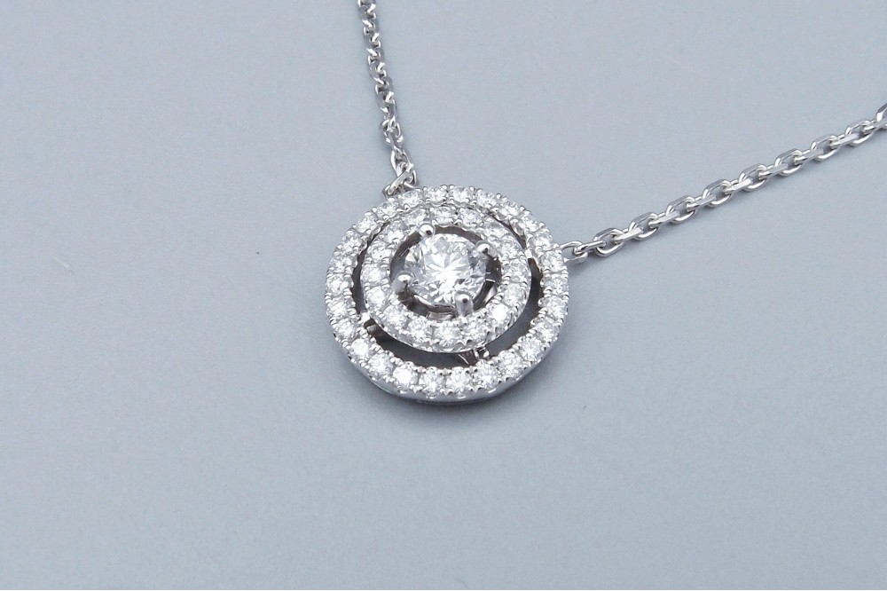 Pendentif diamants double entourage 0.30 ct + 0.50 ct